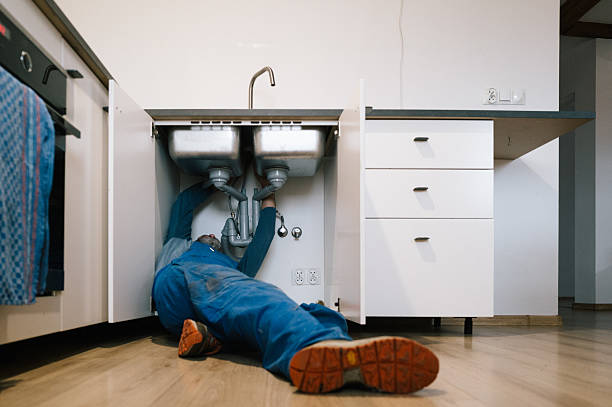 Professional Emergency Plumber technician working in Scituate, MA